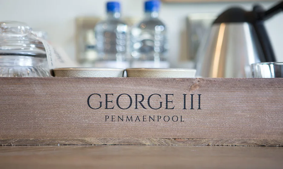 A wooden table that says 'George III' on it